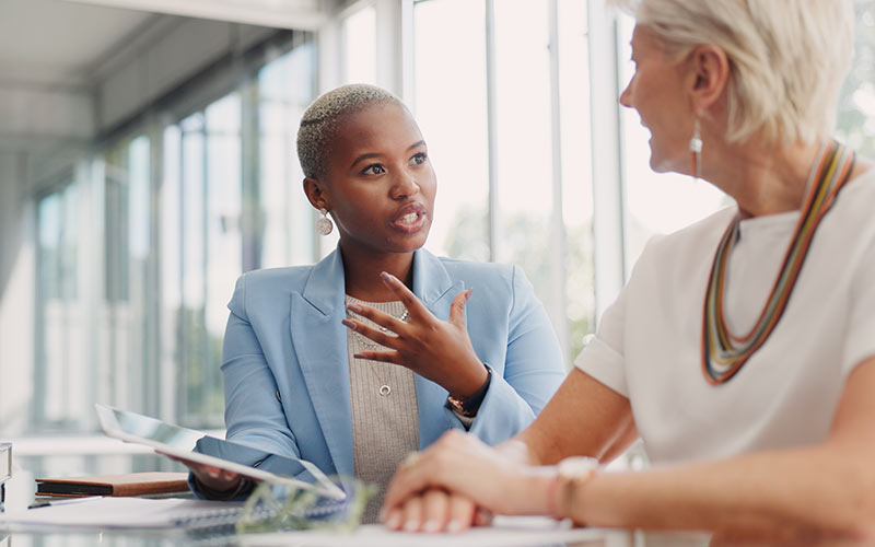People discussing middle manager training